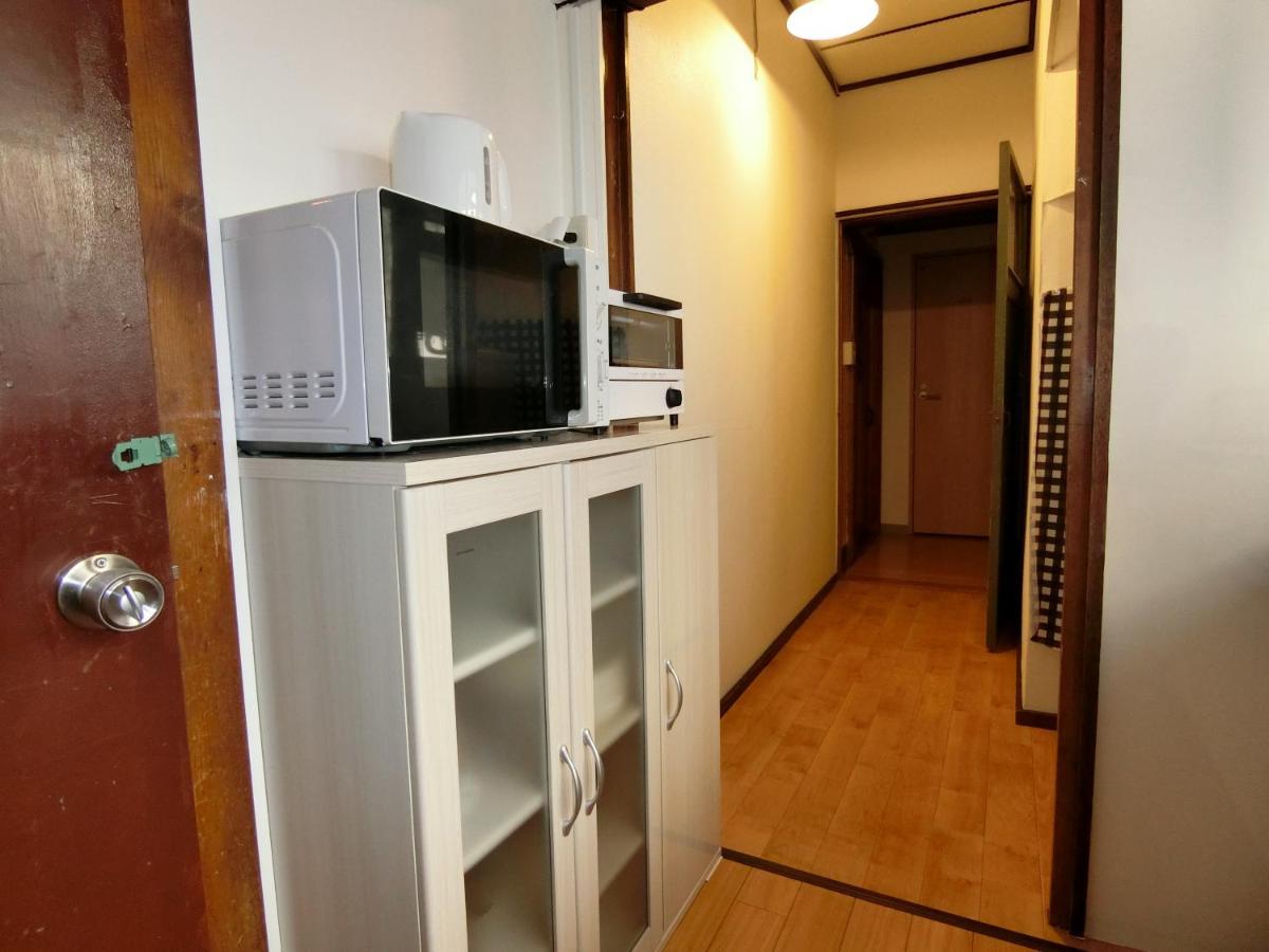 Otaru Guest House Tarune Buitenkant foto